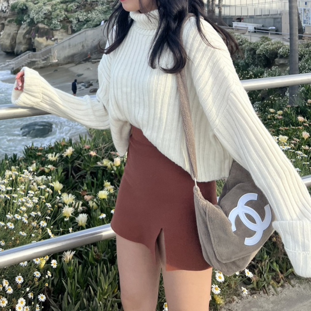 White turtleneck knit sweater